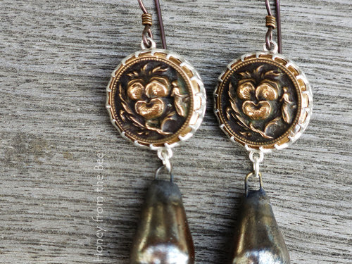 Art earrings with detailed antique pansy buttons