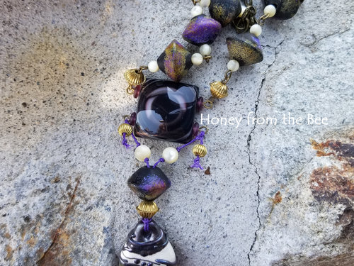 Purple and black artisan necklace