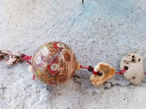 Gorgeous red and stone pendant for the beach lover