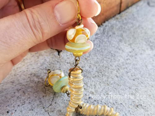 tan and teal lampwork earrings