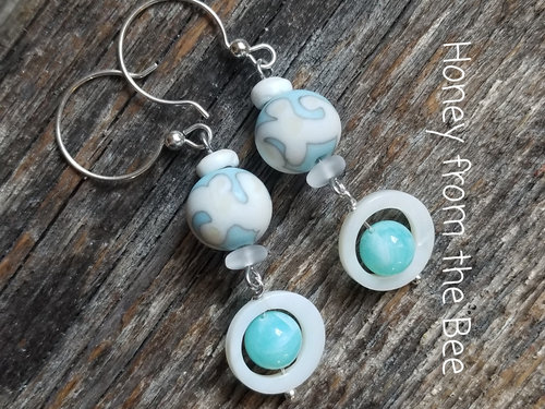 light blue and white earrings