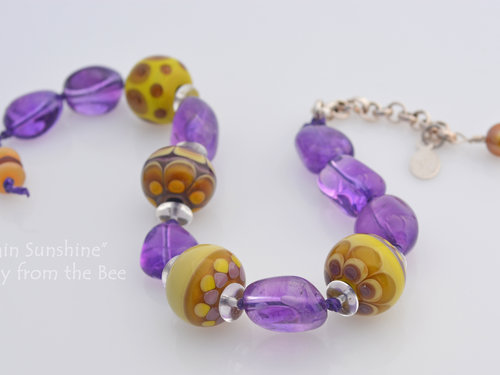 Amethyst and golden lampwork bracelet