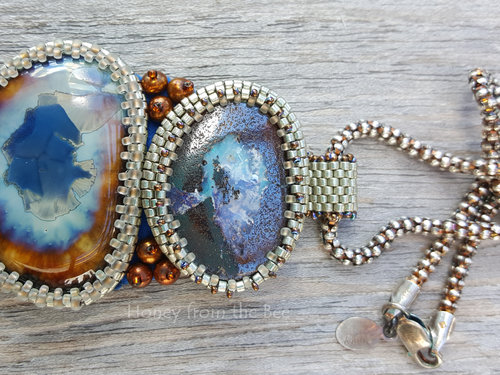 Boulder Opal Artisan Pendant in blues and brown and silver