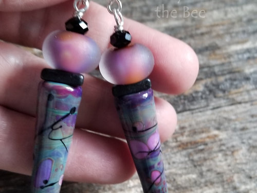 Hot pink and black earrings