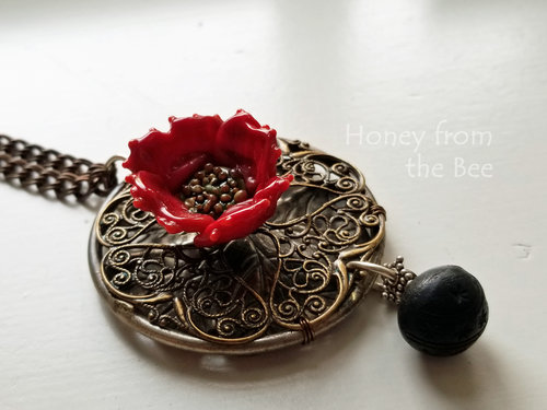 Red poppy artisan necklace