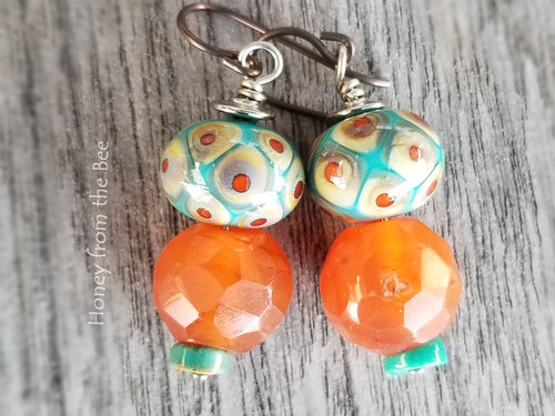 Teal and orange earrings