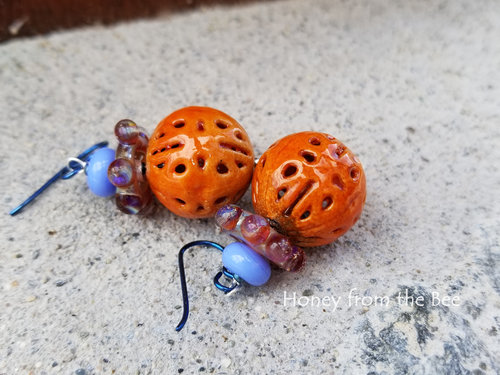 Orange enamel earrings