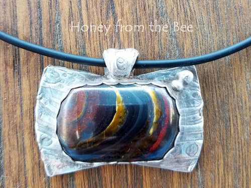 Tiger Iron and Silver pendant