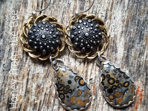Black and gold statement earrings