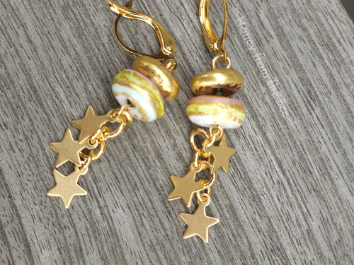 Dangling star earrings