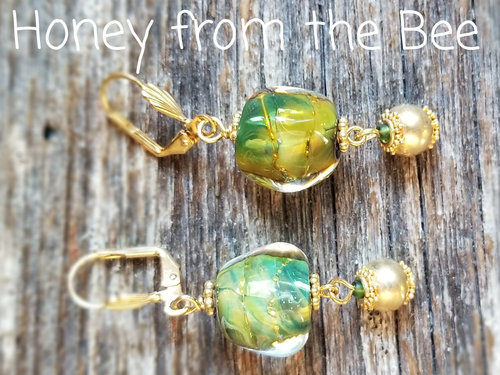 Gold and green lampwork earrings