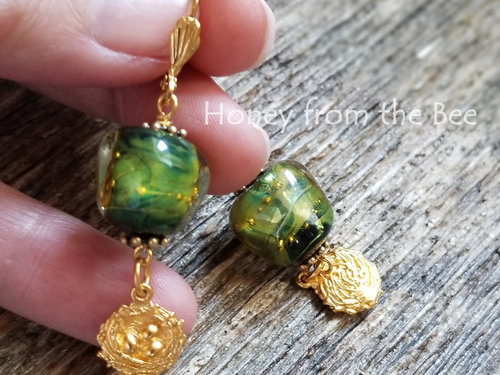 Green and gold earrings