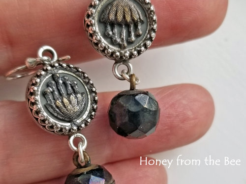 Silver and black antique button earrings