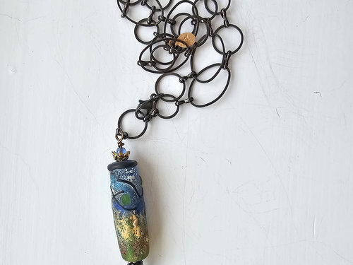Butterfly wing pendant in shades of aqua and yellow