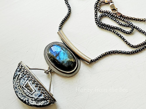Modern artisan pendant in blue and silver