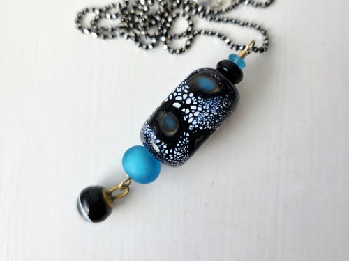 Blue and black lampwork pendant with antique button dangle