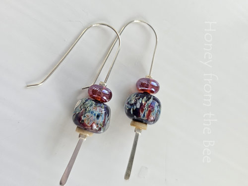 Burgundy and blue earrings feature lampwork and sterling silver