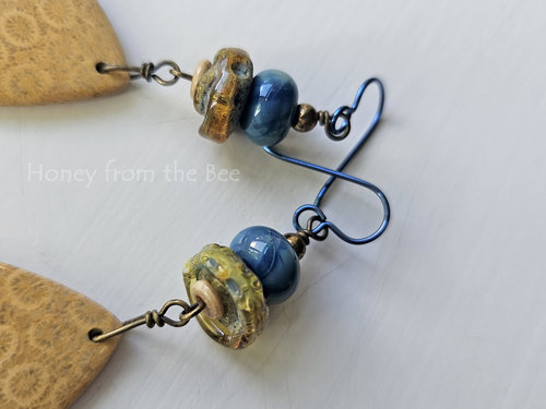 Lampwork earrings in blue and yellow with fossilized coral agate