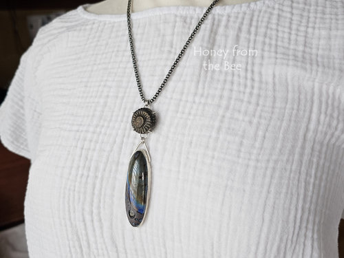 Blue and Bronze pendant - one of a kind - on model