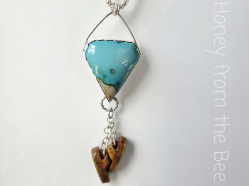 Artisan pendant features blue gem turquoise