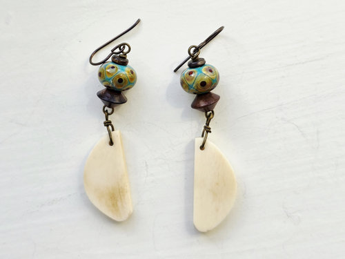 Artisan earrings feature lampwork beads in teal and brown
