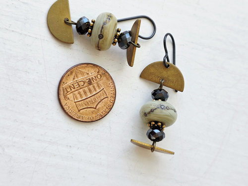 Modern earrings in cream and gold