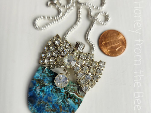 Gemstone and rhinestone necklace in blue and crystals