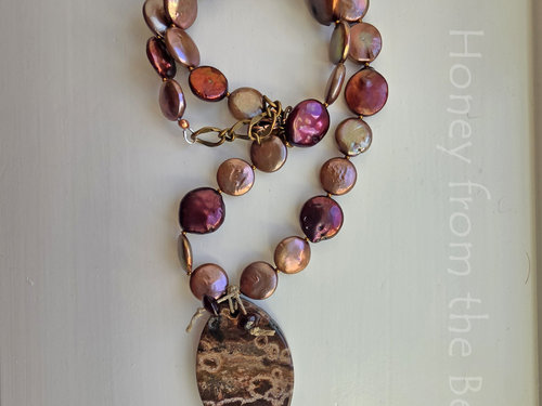 Art necklace in red and rose