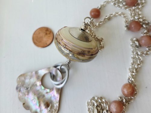 Statement necklace in sterling silver, peach and cream