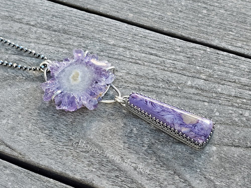 Amethyst pendant set in sterling silver with charoite dangle