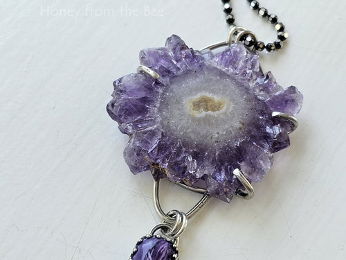 Amethyst crystal slice is featured in this artisan necklace