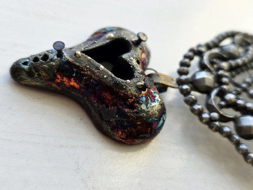 Raku heart necklace with upcycled buckle focal