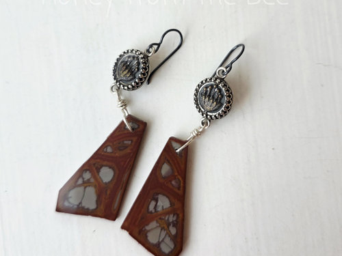 Red and grey earrings feature antique buttons and jasper