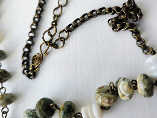 Faceted Rhyolite necklace with mother of pearl