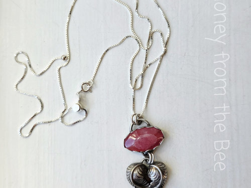 Silver heart pendant with pink cabochon