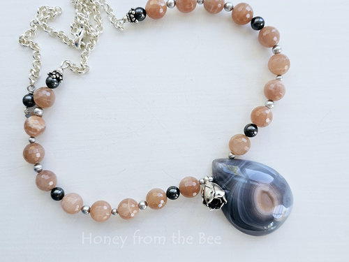 Peach and grey gemstone necklace features Botswana Agate and peach moonstone
