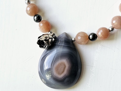 Botswana Agate teardrop necklace with faceted peach moonstone and grey pearls
