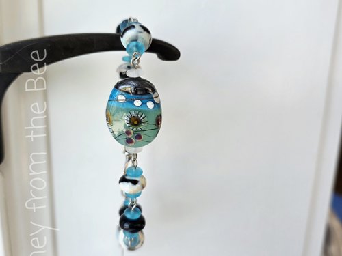 Artisan bracelet in aqua and cream and black