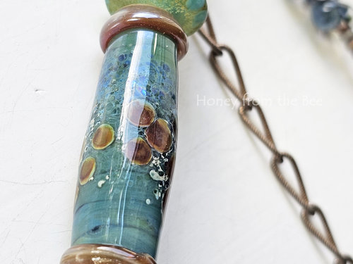 Stunning lampwork necklace in shades of blue and green