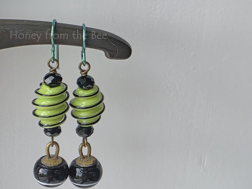 Fun earrings with antique button dangles