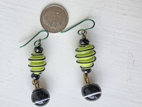 Artisan earrings in green and black