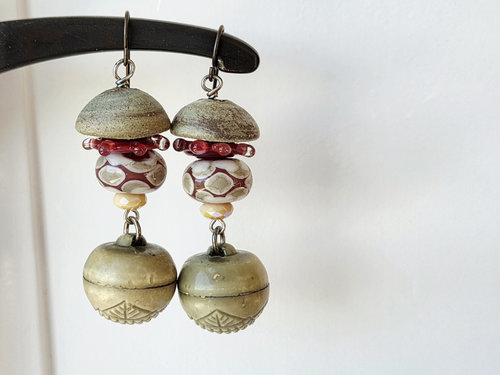 Mushroom earrings feature lampwork in rose and cream