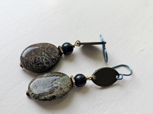 Green gemstone earrings with brass accents