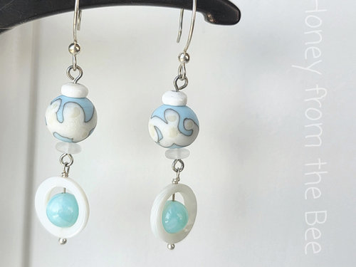 Artisan earrings in sky blue and white