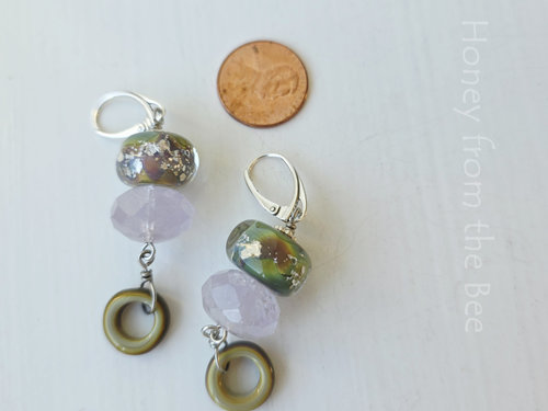 Green and purple earrings feature amethyst and lampwork