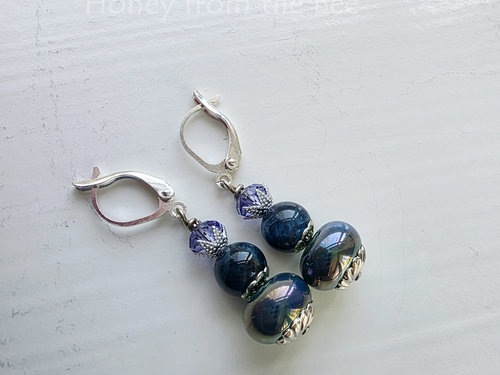 Apatite earrings with lampwork in teal and lavender