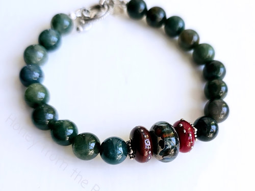 Moss Agate bracelet with lampwork and red and green and dark teal