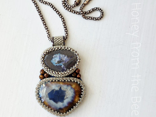 Blue and silver pendant with copper pearls