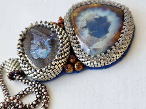 One of a kind necklace features boulder opal