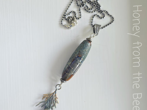 Lampwork pendant with sterling silver juniper branch